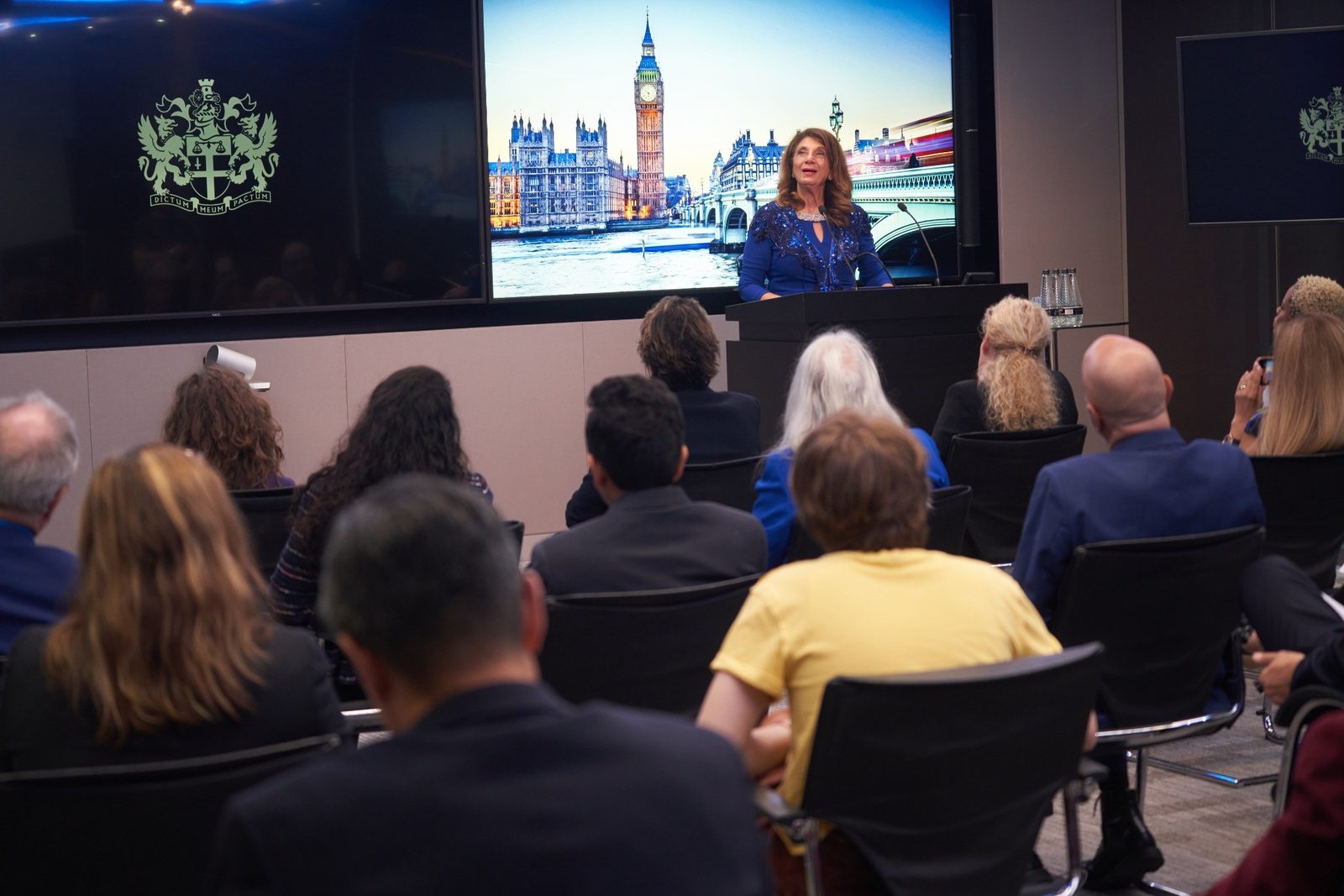 Dr. Dalal Akoury speaking at the London Stock Exchange to doctors and pharmacists about healthcare leadership Dr. Dalal Akoury speaking at the London Stock Exchange to doctors and pharmacists about healthcare leadership