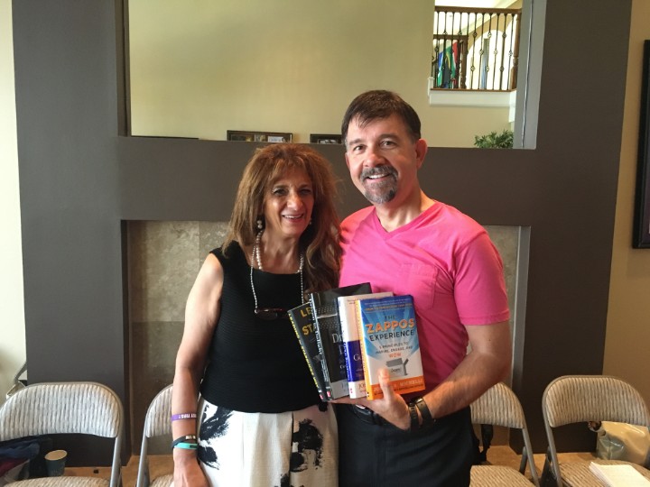 Dr. Dalal Akoury exchanging books and ideas with a fellow entrepreneur